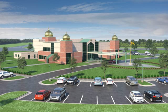 Architect's rendering of the Lenexa gurdwara with its three golden domes, Nishan Sahib and parking lot